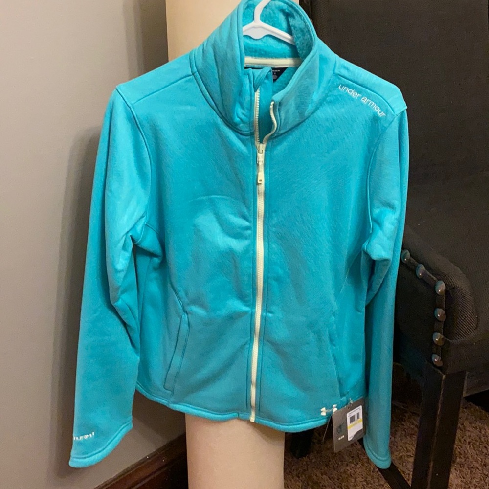 Under Armor zip up size Medium. New with tags! Never worn!